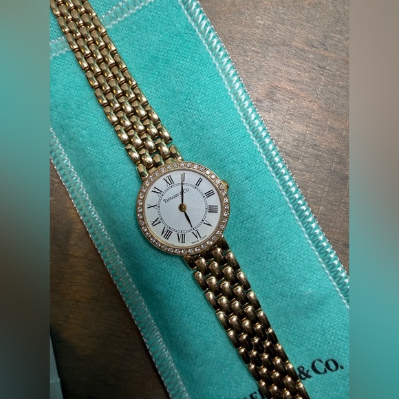 Vintage Tiffany & Co. ladies 14k yellow gold watch with diamonds around bezel. - Picture 3 of 12